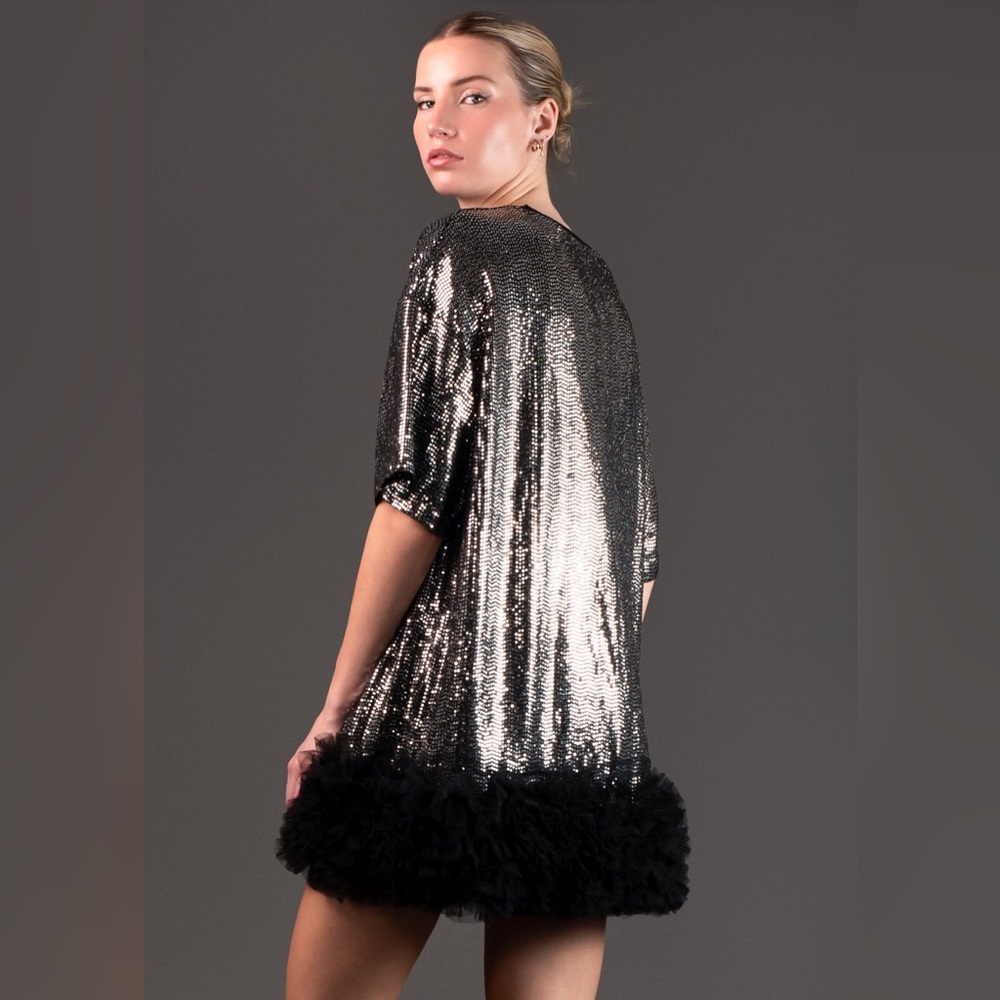 Dress or top by designer Kate Hewko